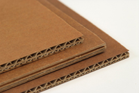 Strengthened corrugated fiberboard